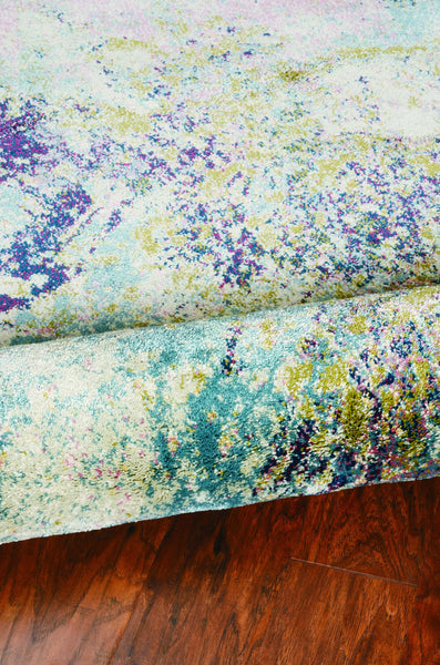 5' x 8' Ivory Abstract Indoor Area Rug