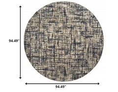 8’ Round Gray and Navy Abstract Area Rug