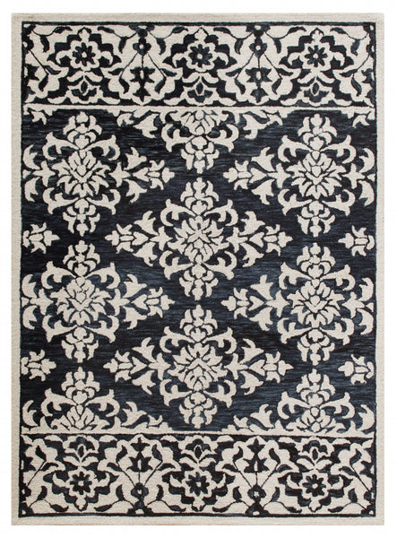 7’ x 9’ Blue and Ivory Decorative Area Rug