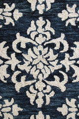 7’ x 9’ Blue and Ivory Decorative Area Rug