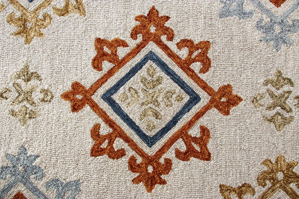 7’ x 9’ Cream and Orange Ornate Diamond Area Rug