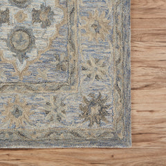 9' x 12' Blue and Tan Traditional Area Rug
