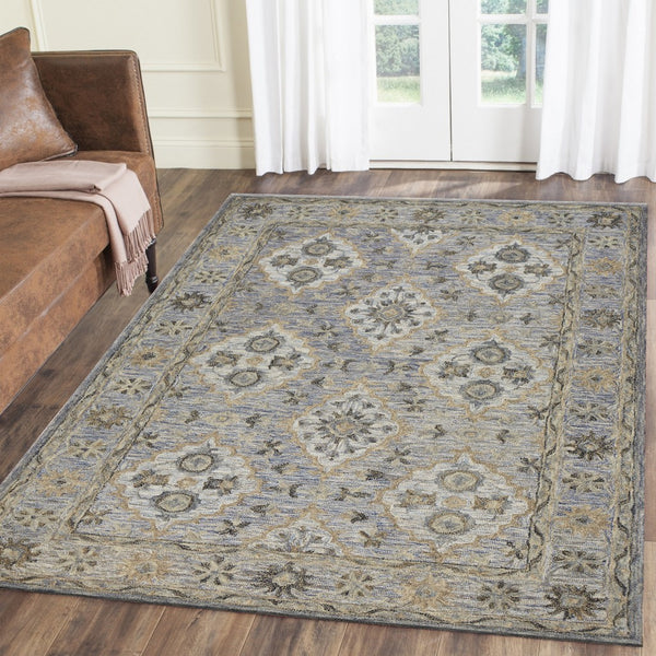 9' x 12' Blue and Tan Traditional Area Rug